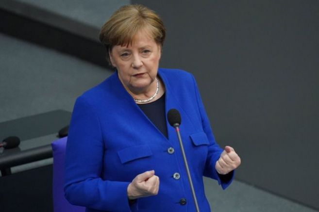 Бившият канцлер Ангела Меркел заяви че не съжалява че е